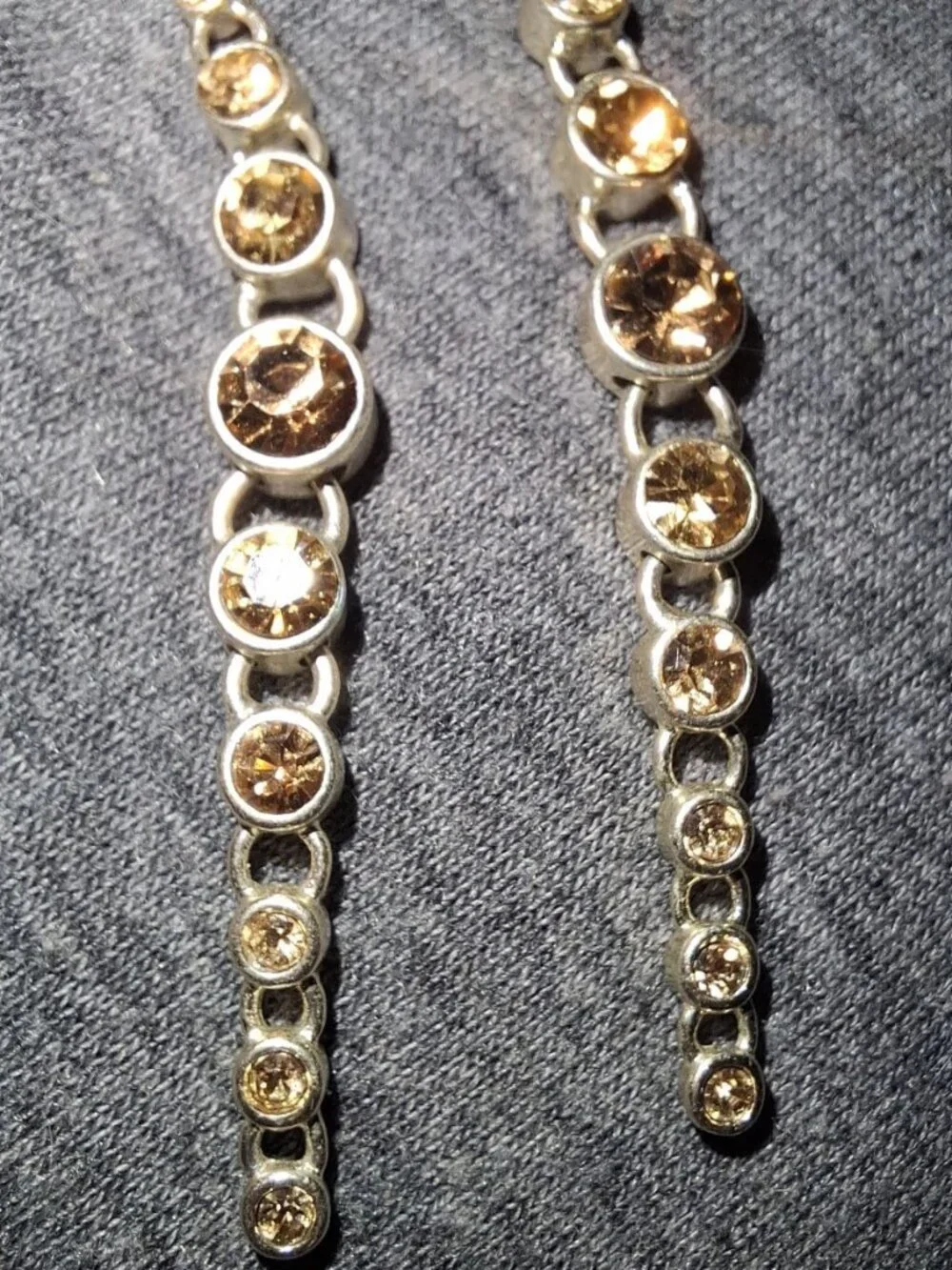Vtg signed Graduated Dangle Hook crystal bezel Earrings signed F fossil?